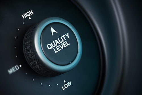 quality level button with low, medium and high positions, button is positioned in the highest position, black and blue background, blur effect